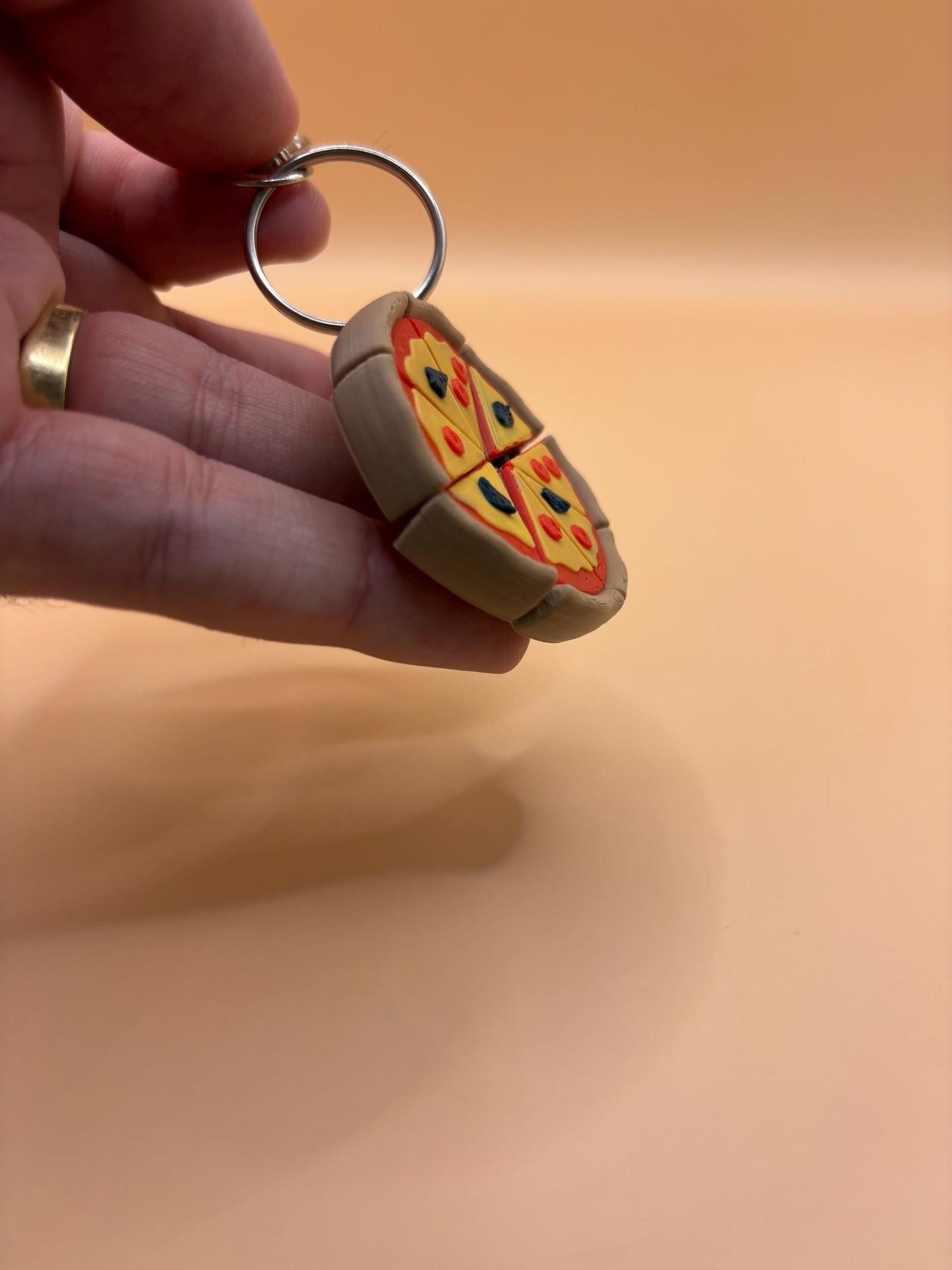 Slice to Meet You – Articulated Pizza Keychain or Magnet That Moves Just Right