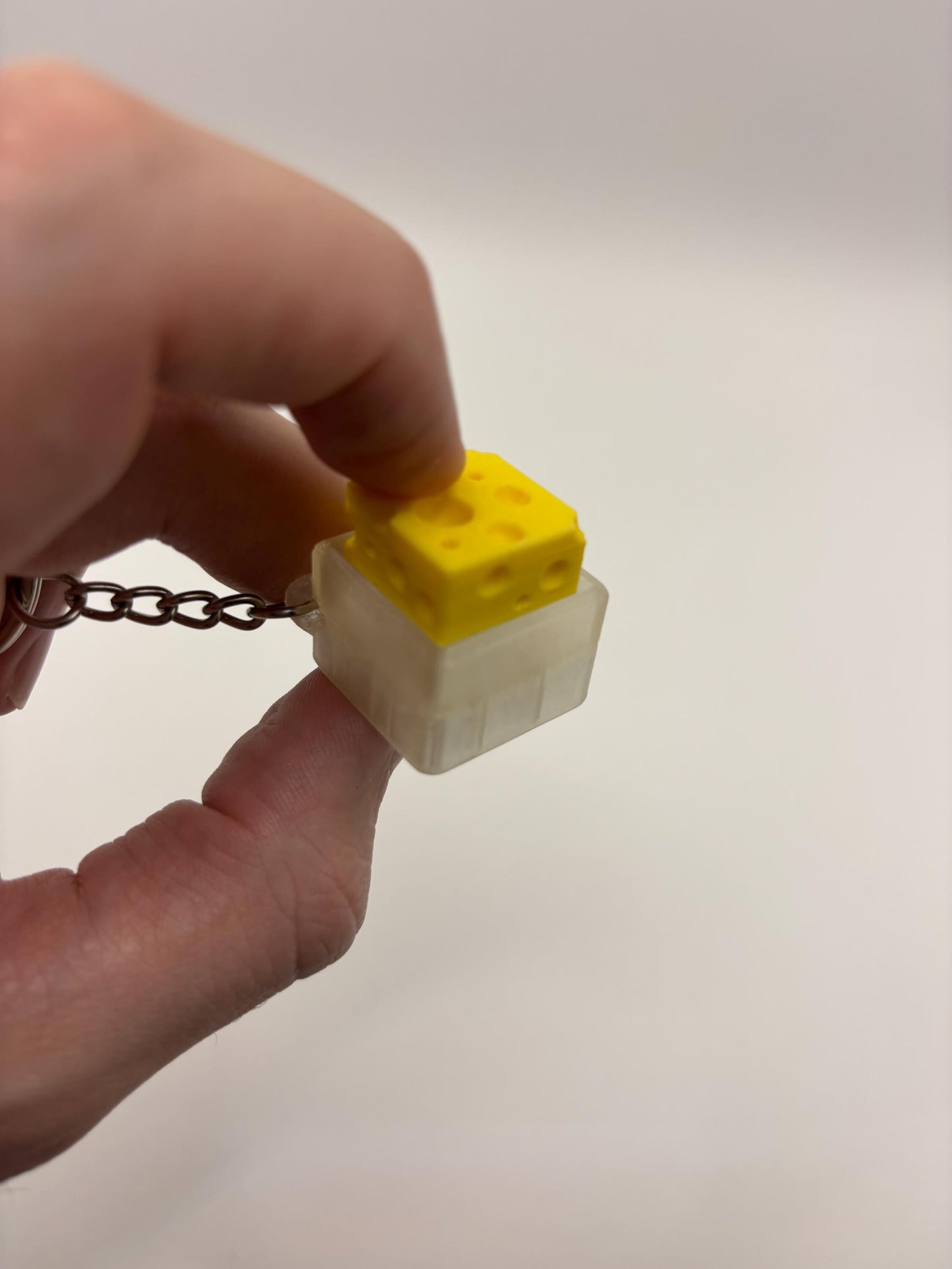 Cheese Shaped Keyring Fidget Clicker/Button – Fun & Stress-Relieving Accessory