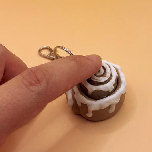 CinnaSnap Keychain – Cinnamon Bun Clicker Fidget Toy